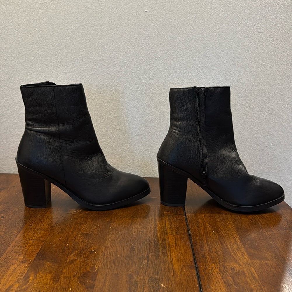 Brand new! Urban Outfitters Black leather heeled booties. Never worn.